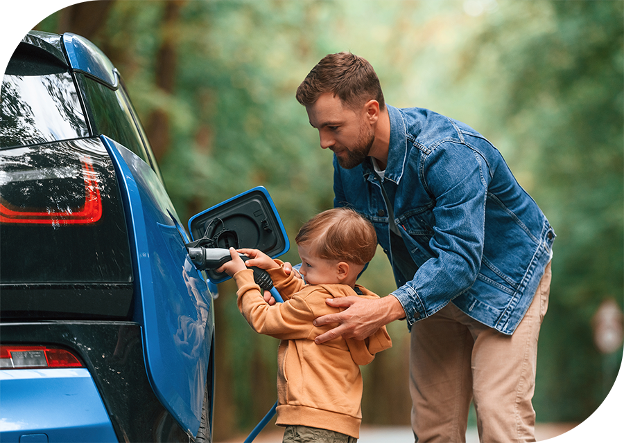 Rounded-Rectangle-Dad-and-kid-charging-blue-car@0.5x.png