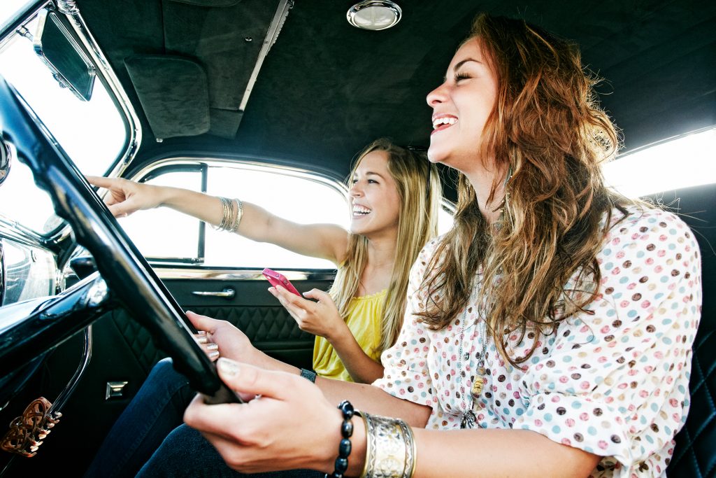 Women driving a car
