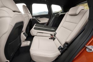 Rear seats folded in BMW iX1 demonstrating flexible space in the car 
