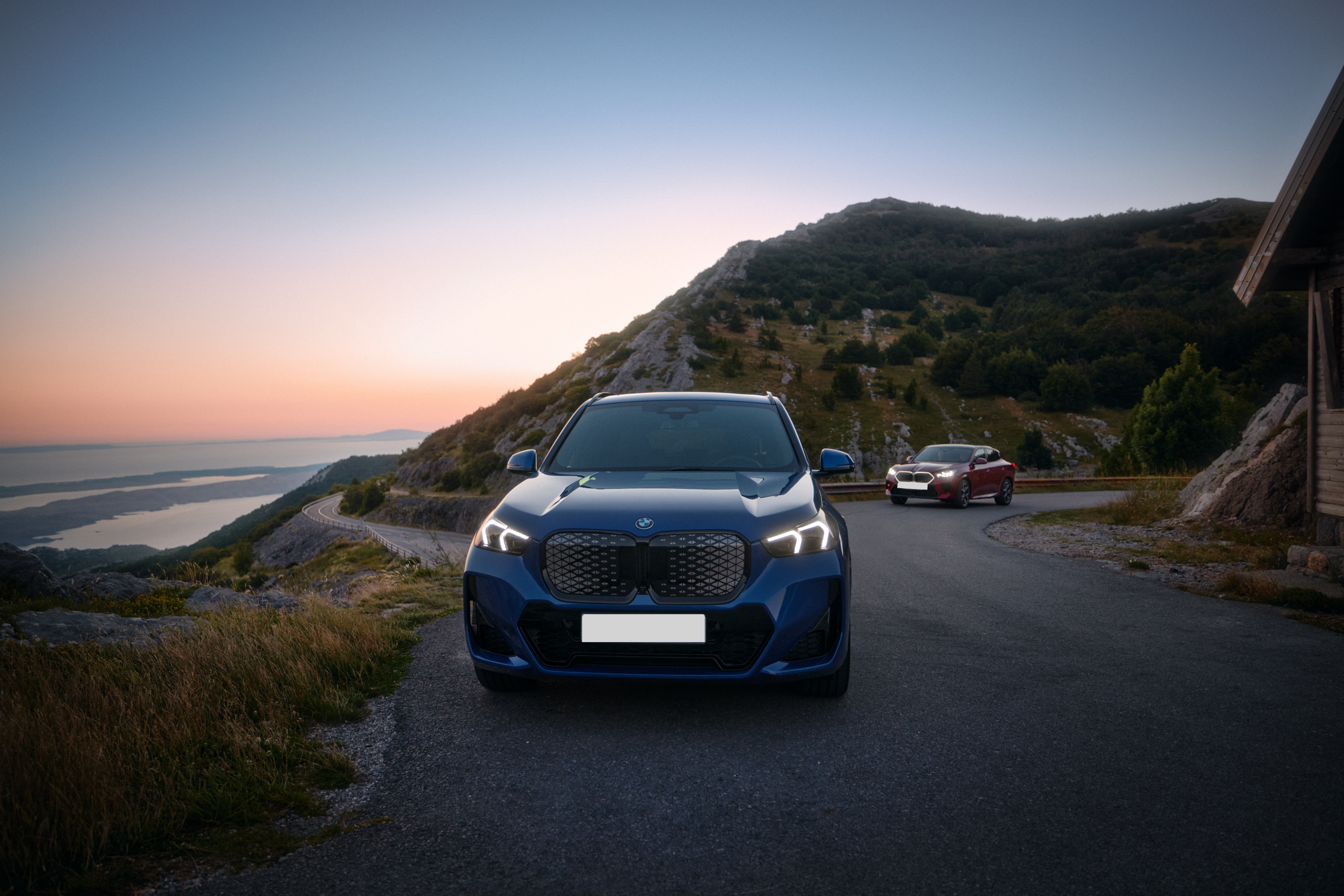 BMW iX2 exterior driving